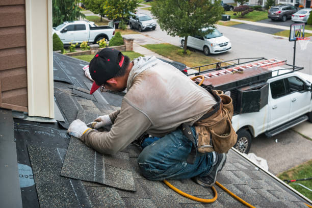 Professional Roofing technician working in Freeport, NY